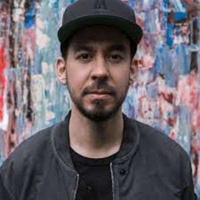 Mike Shinoda posing for a photo shoot